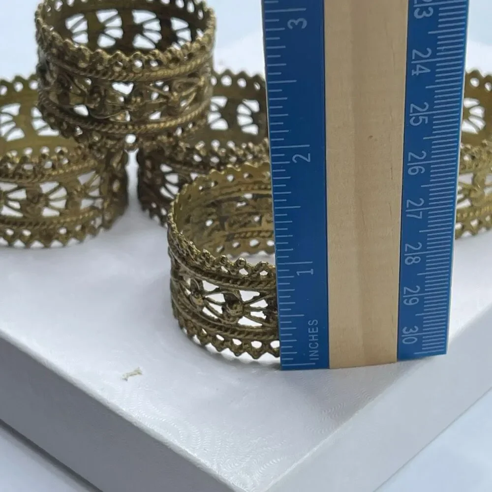 Set of 5 vintage ornate brass napkin ring holders.